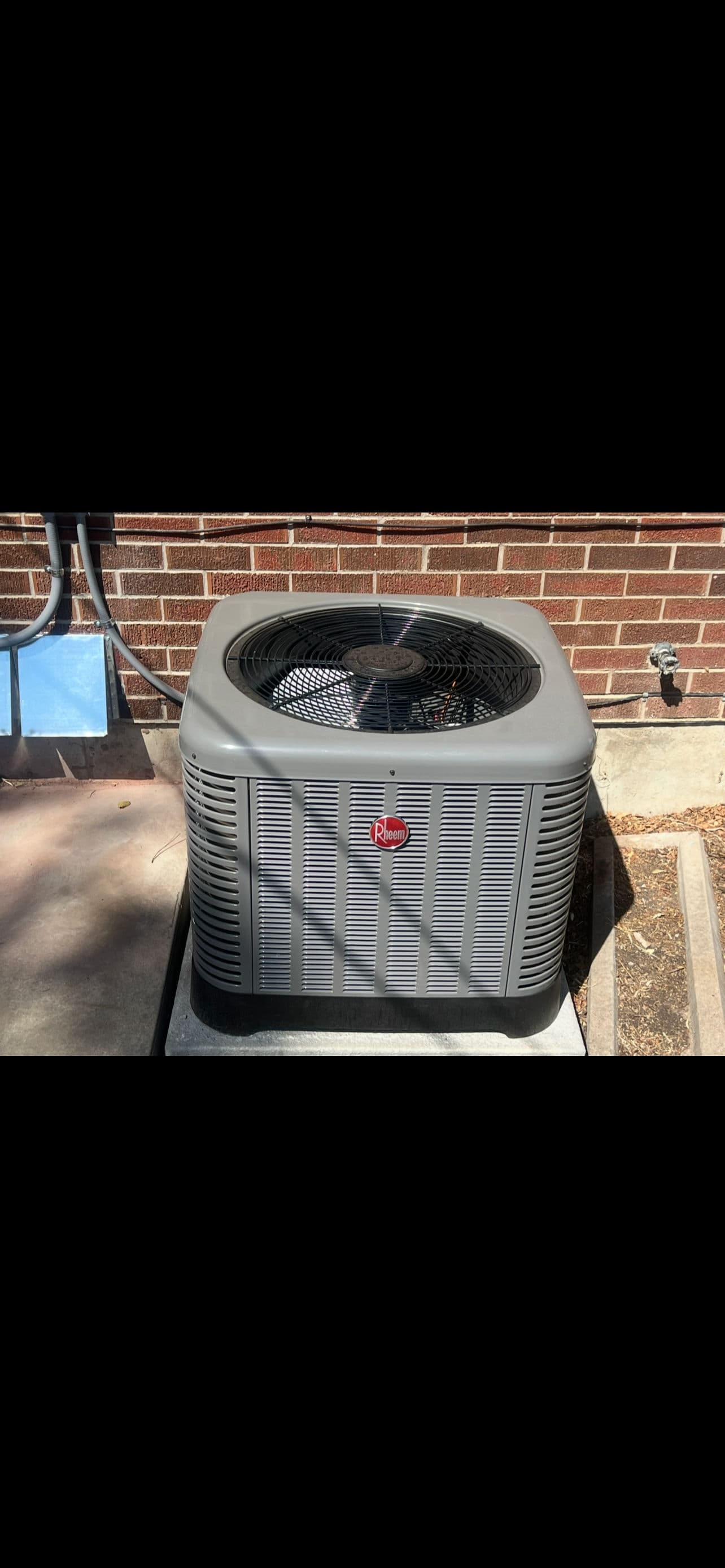 High-Efficiency Rheem HVAC System Installed in Older Home image